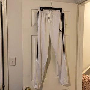 Brand new Tiro TK pants for kids. Size large. NWT